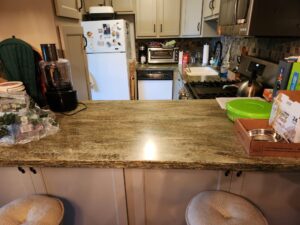 The Kitchen Declutter project begins. Doesn't look too bad if you don't open the cabinet doors