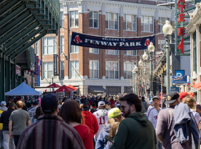 Crowds gather on Landsdown St for the opening day of baseball season