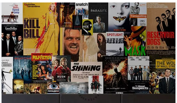 Collage of iconic movie posters arranged on a wall, including classics like The Shining, Pulp Fiction, Forrest Gump, Goodfellas, and The Shawshank Redemption.