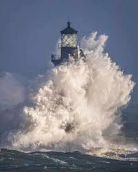 Graves light takes a pounding from the sea at the entrance to Boston Harbor's deep water channel