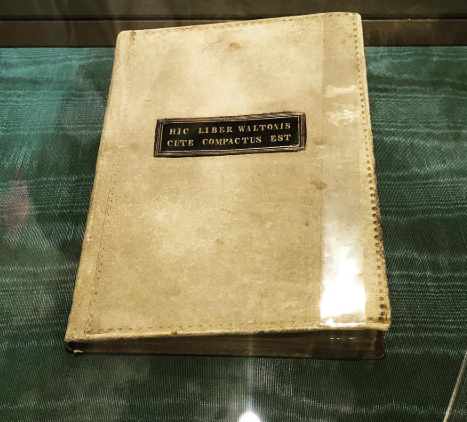 Rare 1837 book bound in human skin at the Boston Athenæum, shown with its Latin‑inscribed cover inside a display case.”