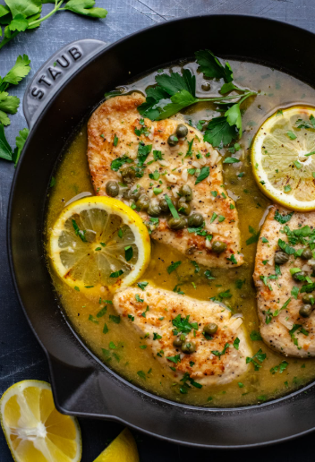 Chicken piccata in a skillet waiting to be served