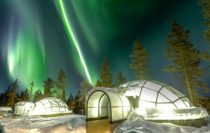 Glass igloos with Northern Lights