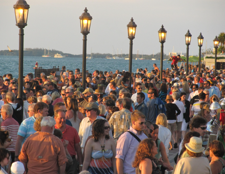 Crowds gather in Mallorty Square, Key west to watch the sun set