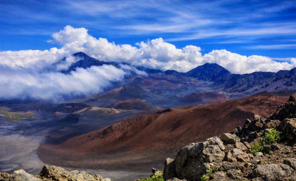 Vibrant, enhanced photo of Haleakala’s volcanic terrain with sharp detail and dramatic cloud formations.