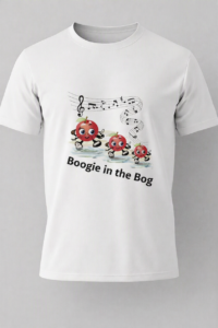 A white T‑shirt featuring a playful design of three red cartoon bog creatures dancing beneath musical notes and a treble clef. The text below them reads “Boogie in the Bog.”